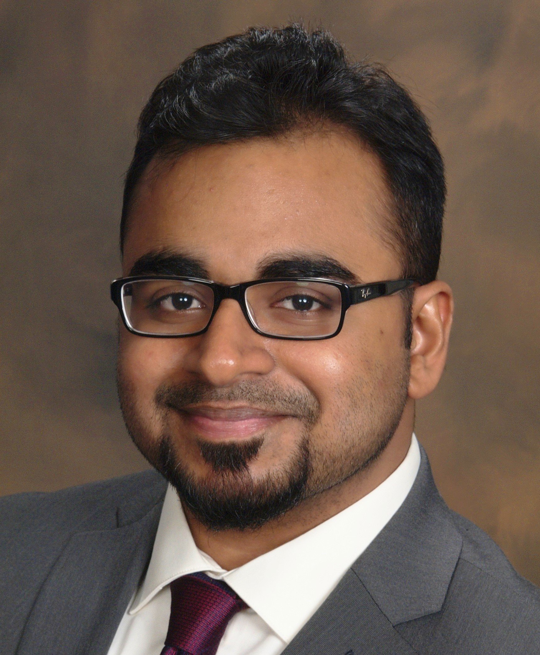 Dr. Abraham - headshot Kerry-Gould